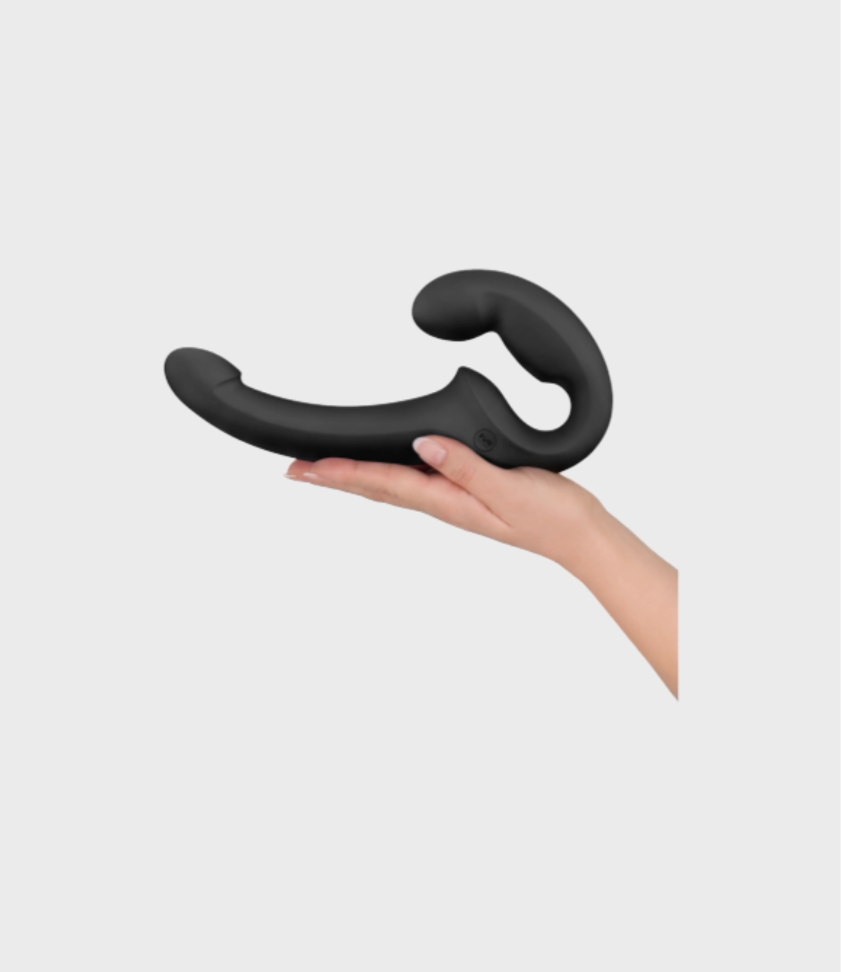 Share Lite vibrador para parejas negro sostenido en la mano